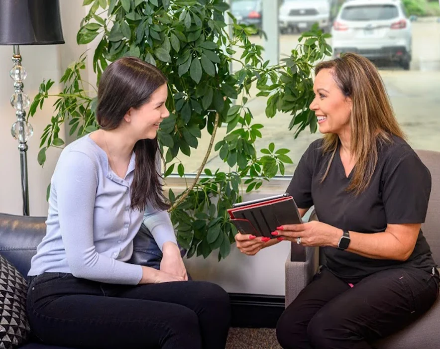 Dentist in South Austin Dental assistant with patient